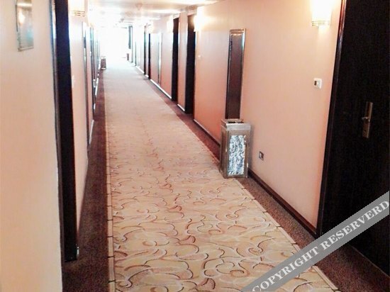 Цюйцзин: Xinshiji Business Hotel