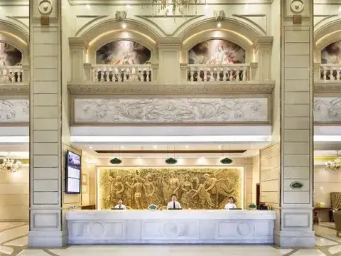 Наньнин: Vienna Intemational Hotel( Ming Xiu Road Subway Station)