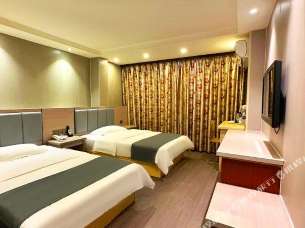 Жичжао: Guiqi Business Hotel (Rizhao Suning Plaza)