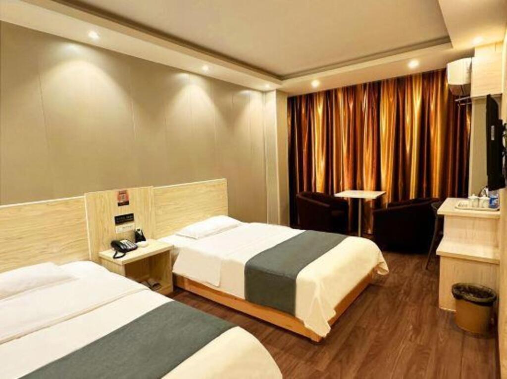 Жичжао: Guiqi Business Hotel (Rizhao Suning Plaza)