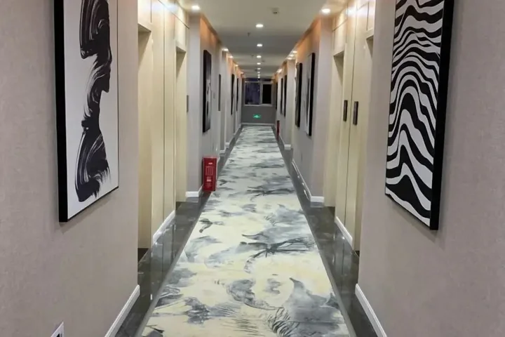 Синъи: Baijia Hotel