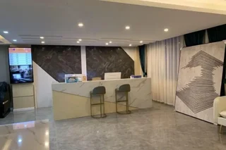 Синъи: Baijia Hotel