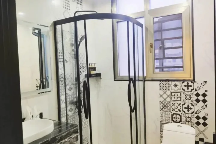 Синъи: Baijia Hotel