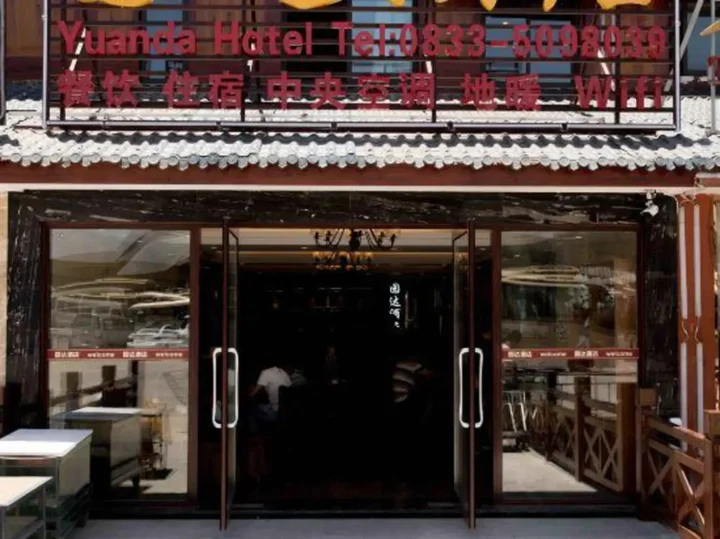 Лешан: Yuanda Hotel