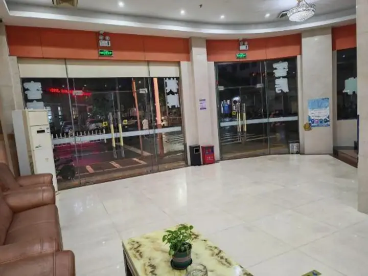 Джиангме: Yongsheng Business Hotel