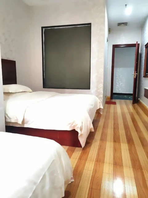 Джиангме: Yongsheng Business Hotel