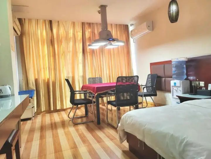 Джиангме: Yongsheng Business Hotel