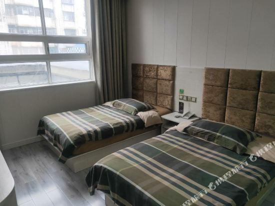 Чжоукоу: Naya Chain Hotel
