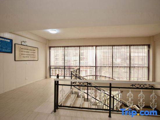 Ичан: Xinshidai Business Hotel