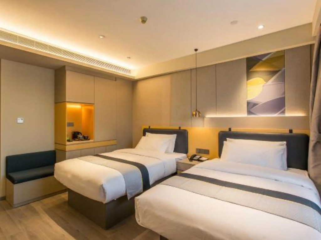 Линьи: Home Inn Business Travel Hotel (Linyi Railway Station Zhanqian Plaza Branch)