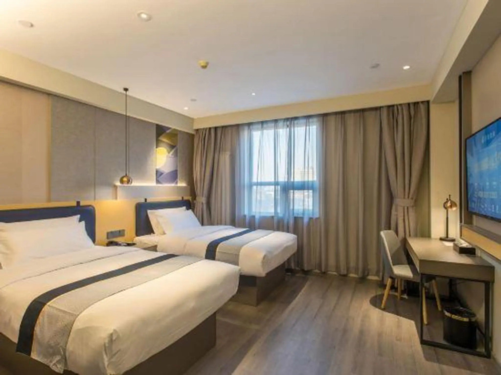 Линьи: Home Inn Business Travel Hotel (Linyi Railway Station Zhanqian Plaza Branch)