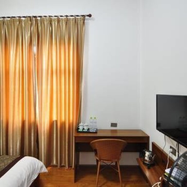 Юйси: Boke Holiday Inn