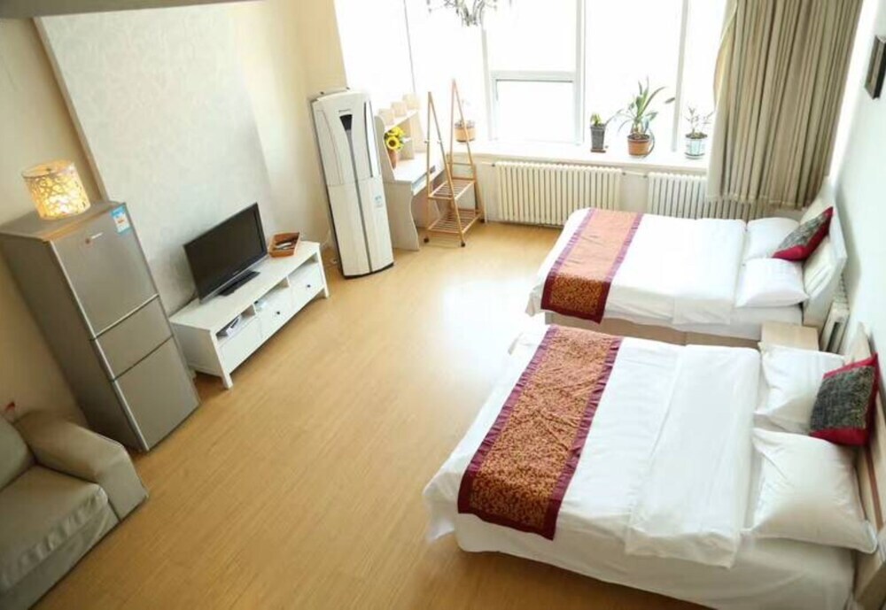 Далянь: Dalian Feel Like Coming Home Apartment