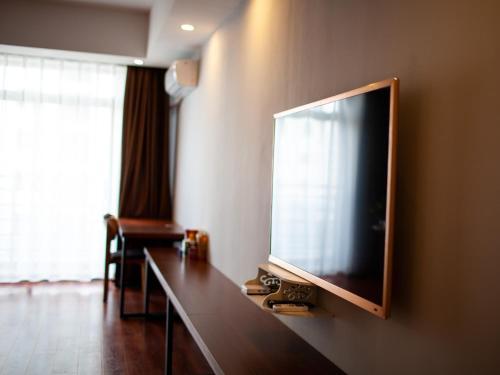 Куньмин: Tenho Hotel