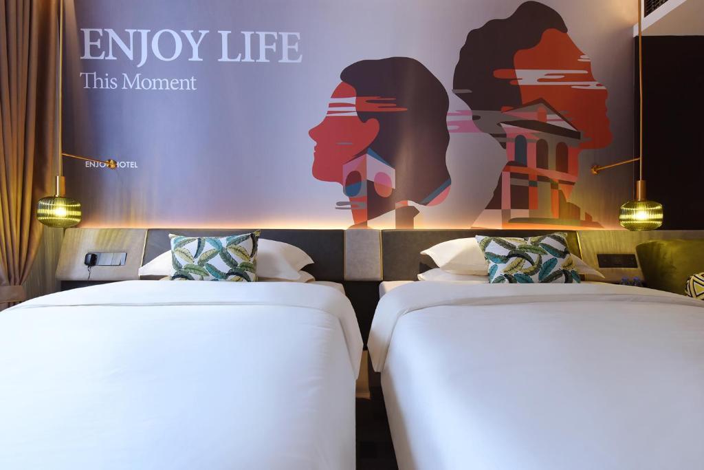 Ичан: Enjoy  Hotel