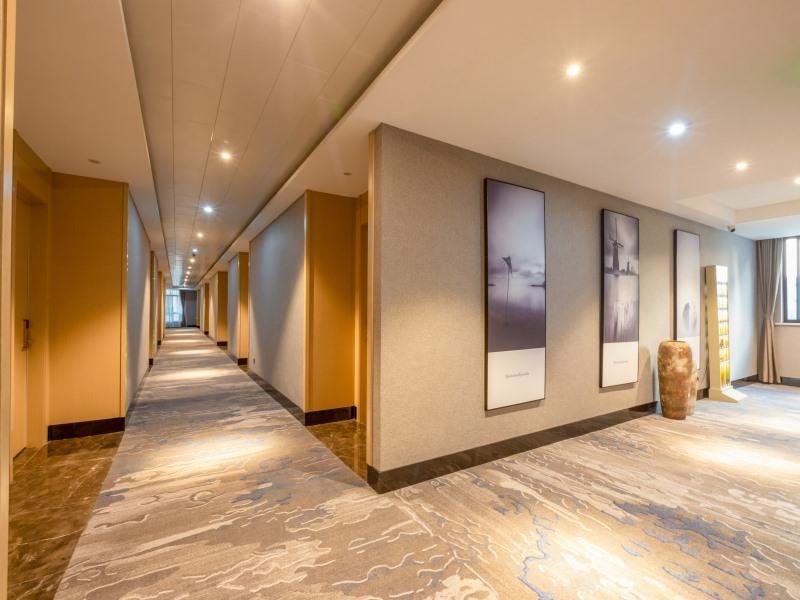 Чжэньцзян: Shell Hotel Zhenjiang Danyang Baibaiban People Square