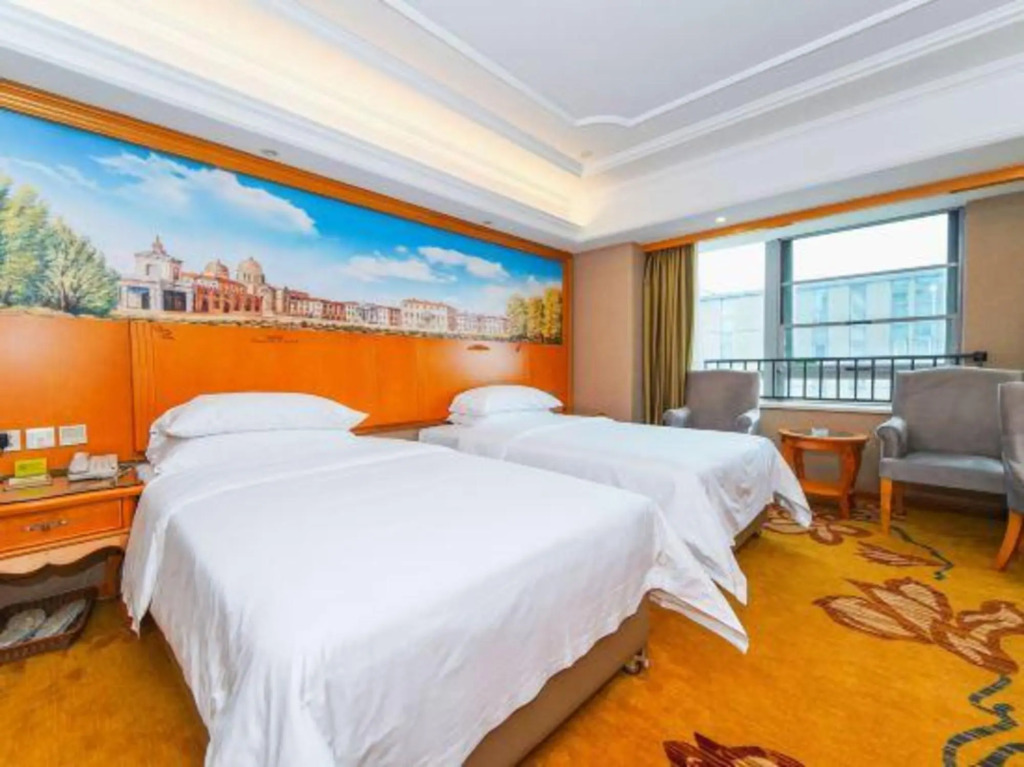 Наньчан: Vienna International Hotel (Nanchang Honggutan Xuefu Avenue)