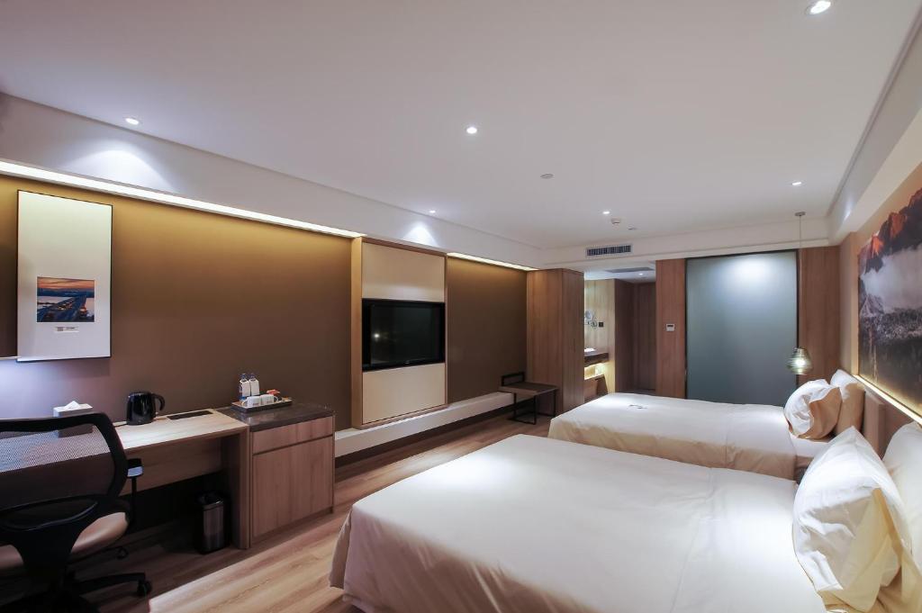 Харбин: Vienna Hotel (Harbin High-speed Railway Wanda Plaza)