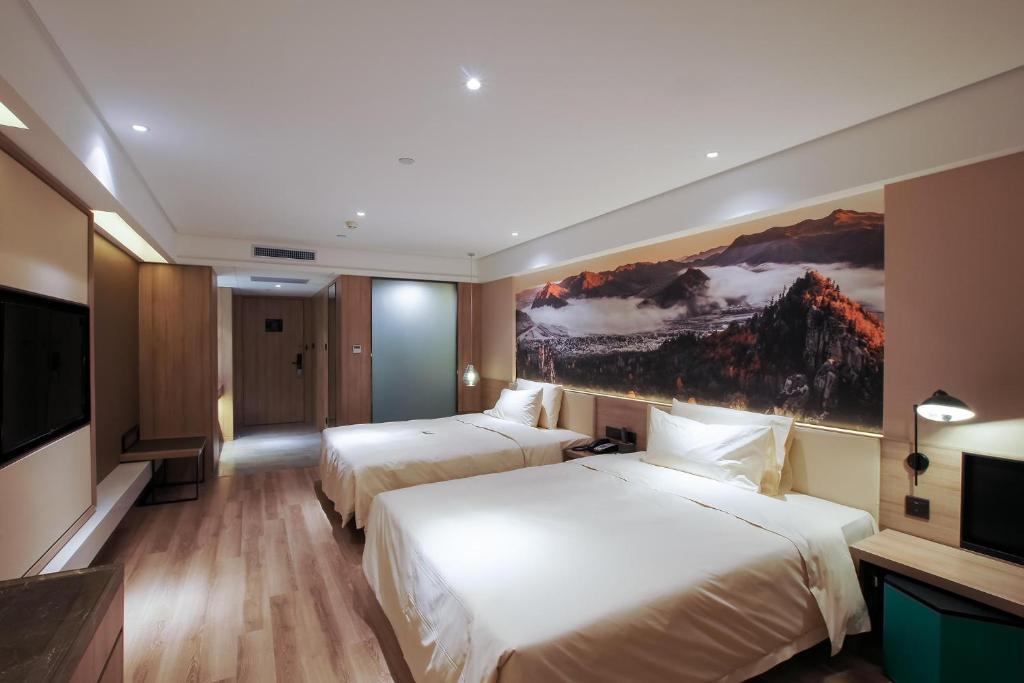 Харбин: Vienna Hotel (Harbin High-speed Railway Wanda Plaza)