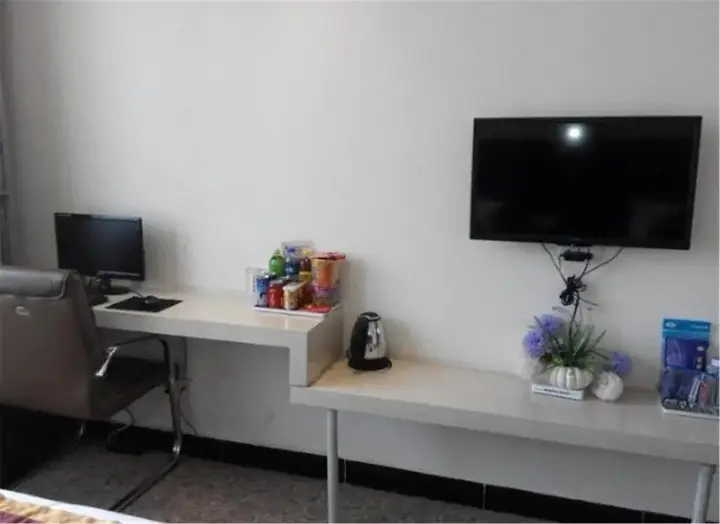 Сяньян: Jin Haonan Business Inn