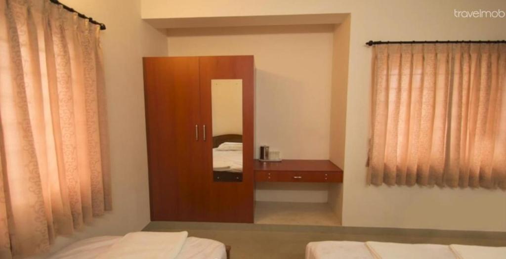 Коимбатур: ThulasiRams Service Apartments