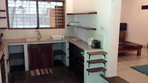 Калапет: R M Guest House