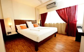 Мангалур: Ayush International Hotel