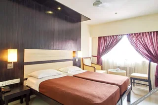 Мангалур: Ayush International Hotel