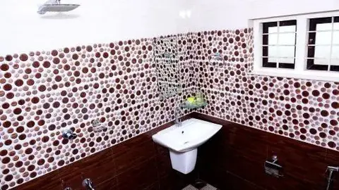 Куттикканам: Thekkekara Tourist Home Vagamon