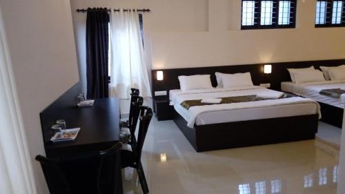 Кумили: Charles Premier Inn