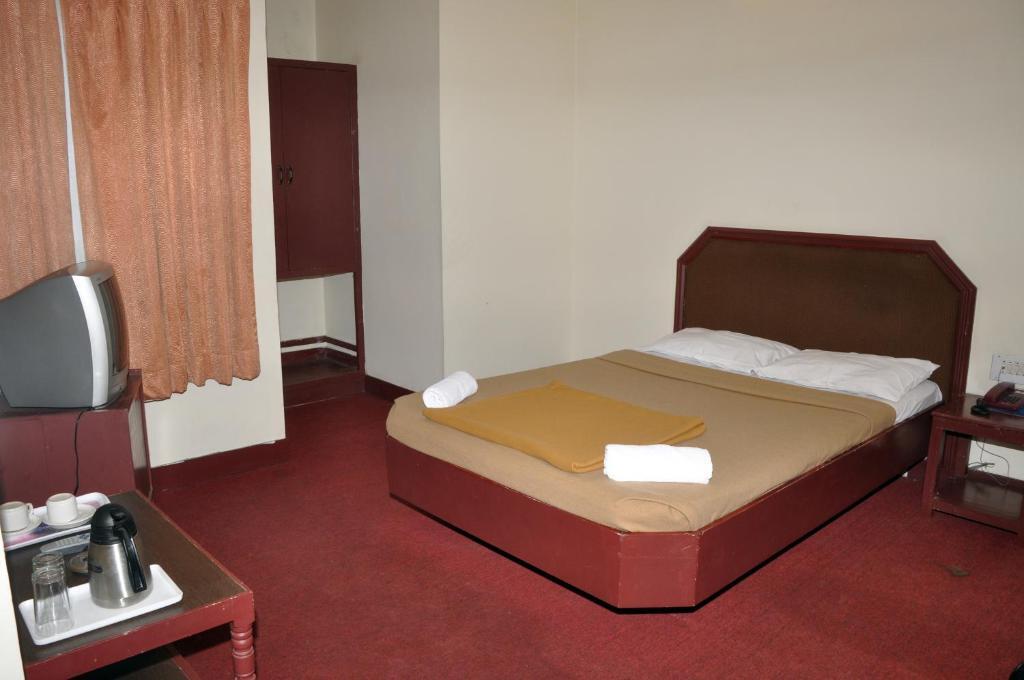 Ути: Hotel Blue Hills International