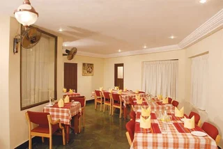 Кумили: Michaels Inn