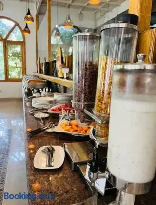 Куфри: Aamod at Shoghi