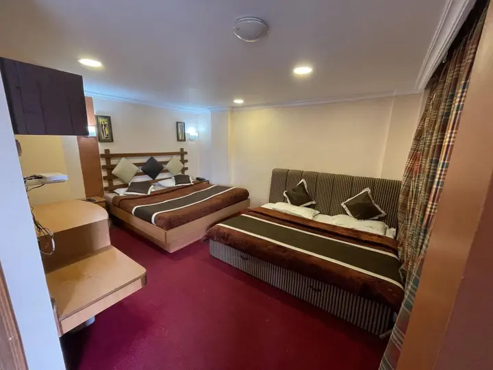 Ути: Hotel Maneck
