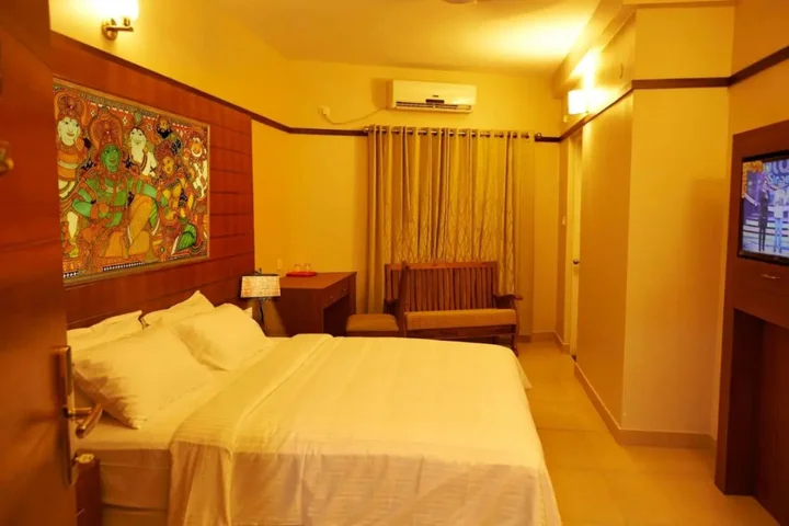 Гуруваюр: Srivar Hotels