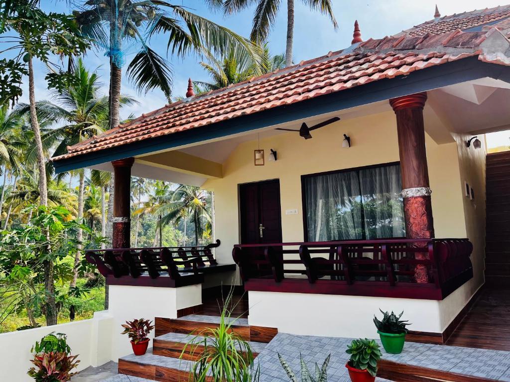 Варкала: Maadathil Cottages