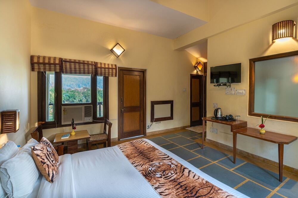 Наинитал: Corbett Wild Resort- A River Access Property