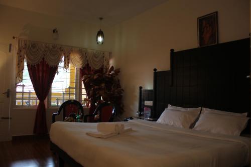 Муннар: The Green Carpet Hotel
