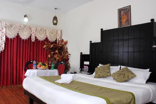 Муннар: The Green Carpet Hotel