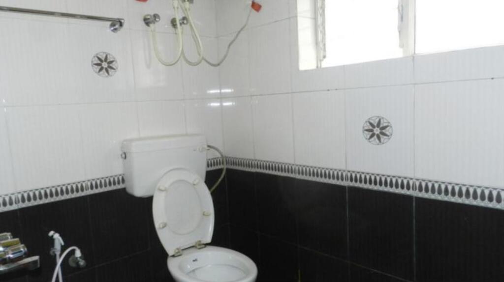 Ути: Wave Inn Cottages