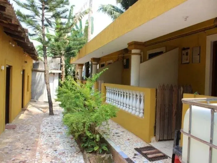 Анджуна: Purushottam Guest House