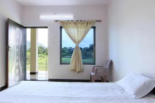 Киим: Nisarg Guest House