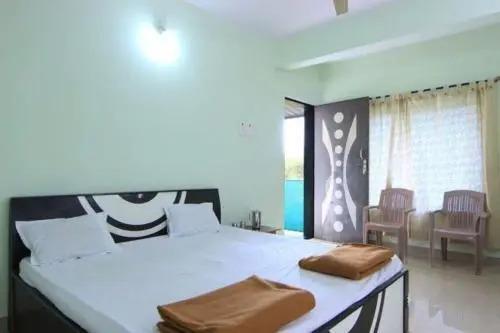 Киим: Nisarg Guest House