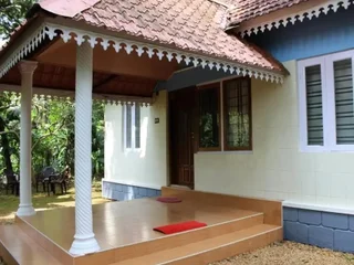 Муннар: Jojo Cottages