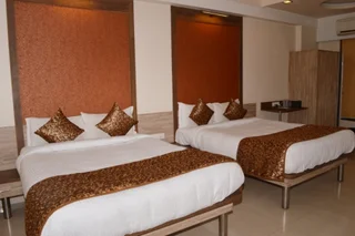 Вапи: Budget Inn Palm Regency