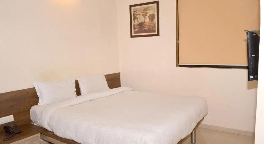 Вапи: Budget Inn Palm Regency