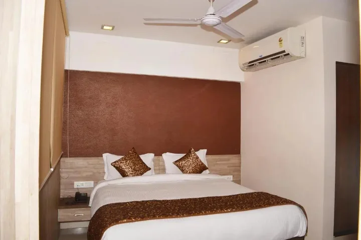 Вапи: Budget Inn Palm Regency
