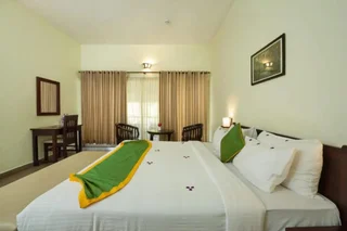 Велламундра: Abad Brookside Wayanad