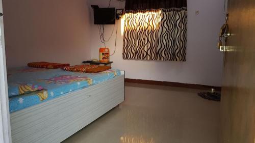 Сазан: Nitinbhai Home Stay