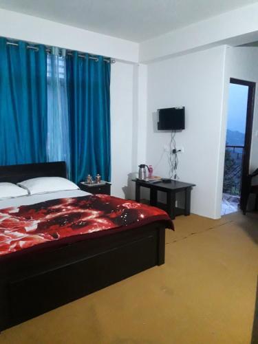 Пеллинг: Ravangla Hotel Happy Home